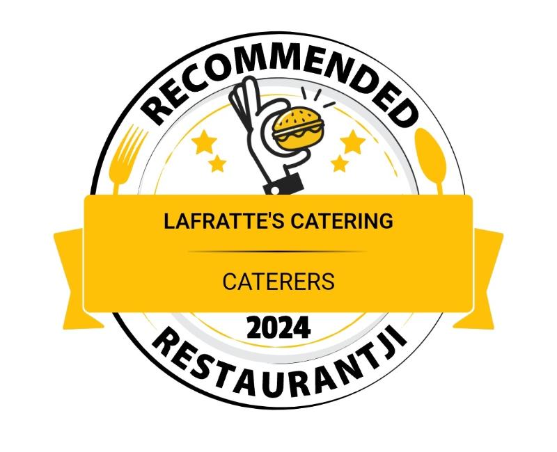 A LaFratte's catering table display with Italian-American dishes beautifully presented
